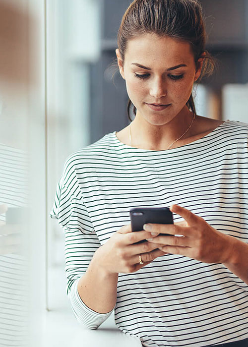 woman-texting-inquiry-sica-marketing-saskatoon-digital-online-marketing-ai-solutions-for-business Woman is texting Sica Marketing in Saskatoon for assistance with her business online marketing and lead gen